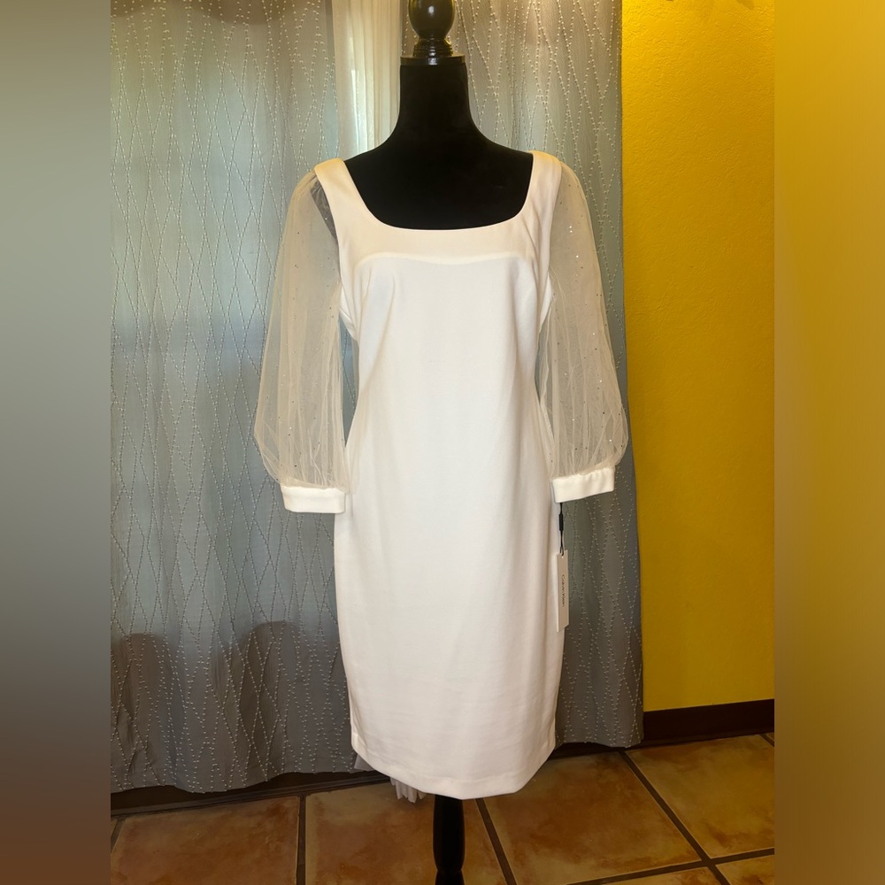 Calvin Klein white dress with see-through rhinestone sleeves